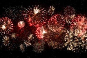 a group of fireworks in the night sky