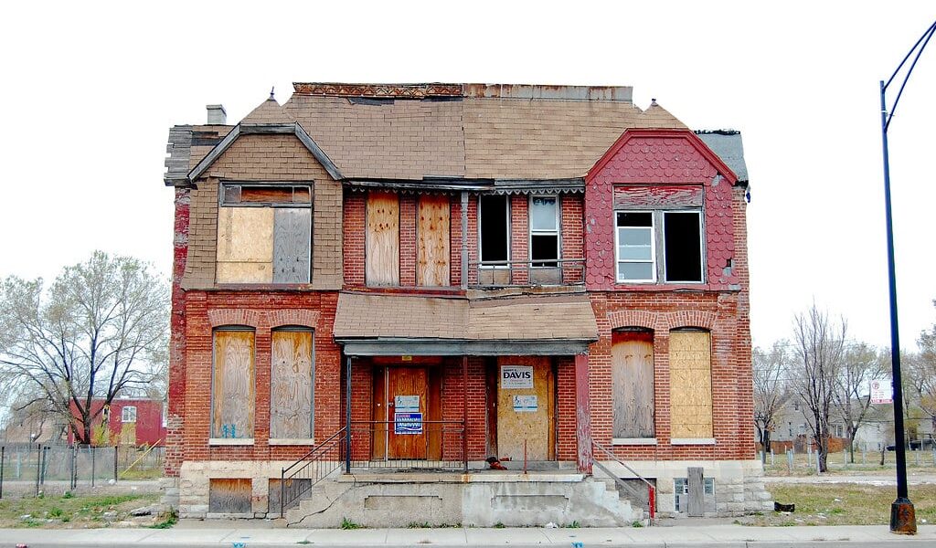 A House That Is Parked On The Side Of A Building