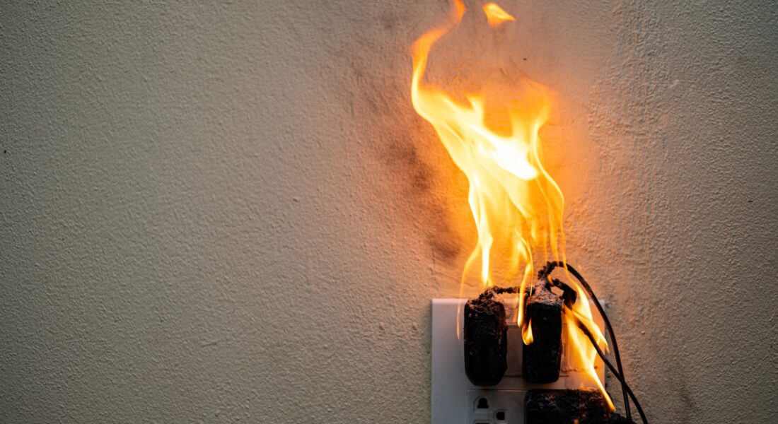 Start Of An Electrical Fire In Living Room Of A House