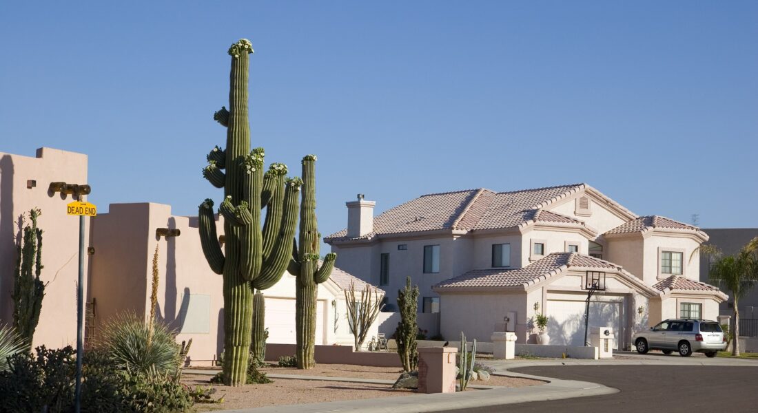 A Close Up Of A Street In Front Of A House