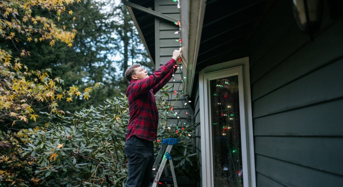 A Person Standing In Front Of A Building
