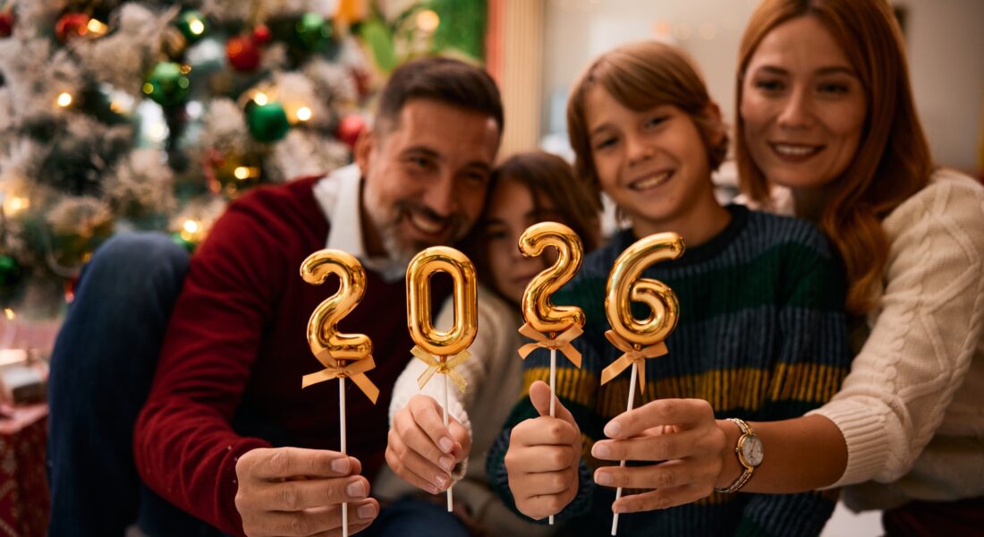 A Group Of People Smiling For The Camera